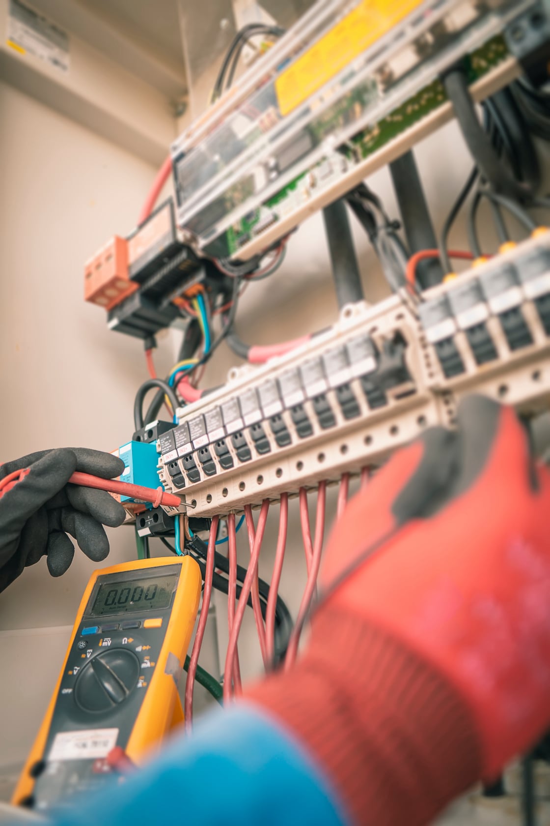 Engineering used a multimeter to measure the voltage of electrical wires