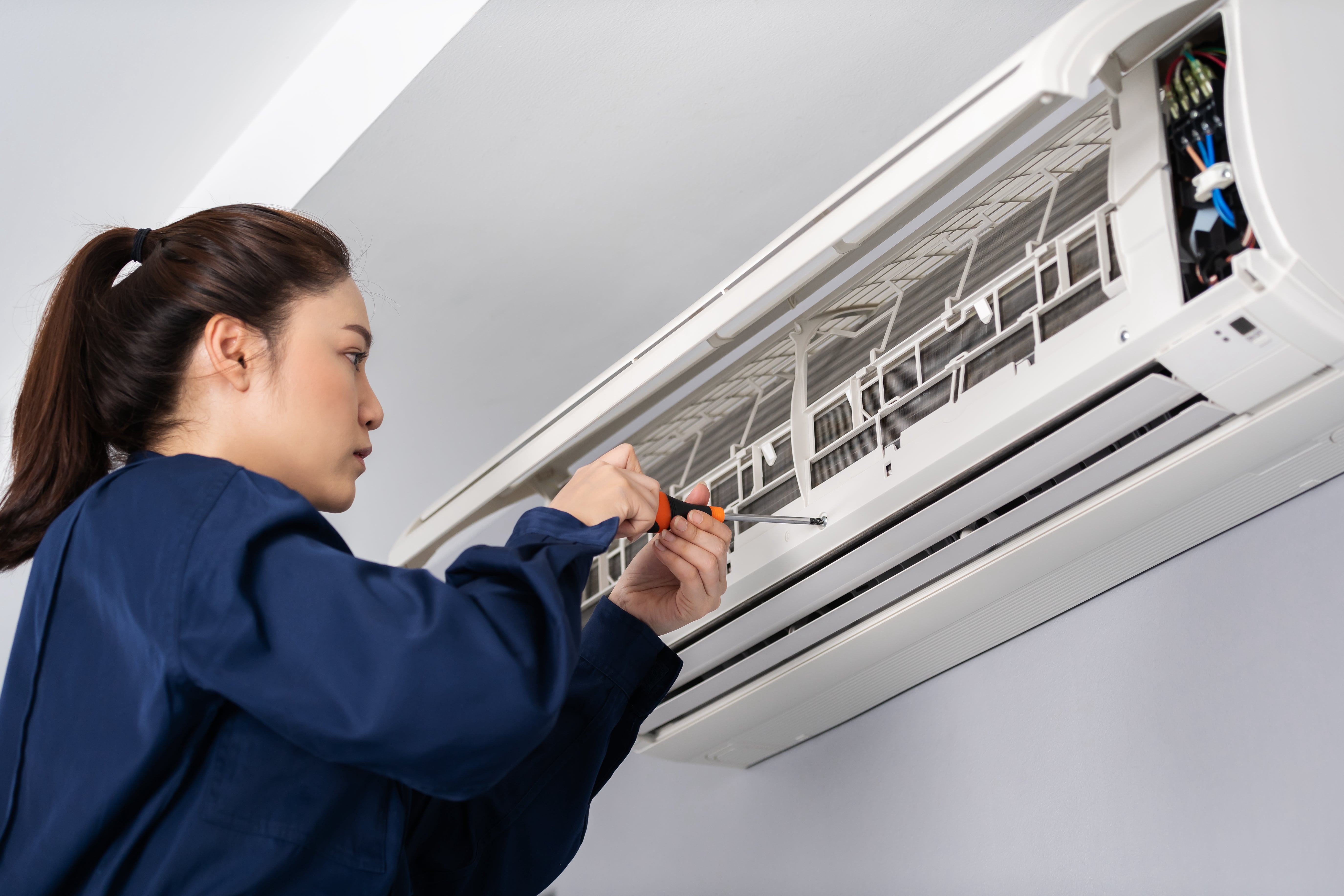 women working on hvac